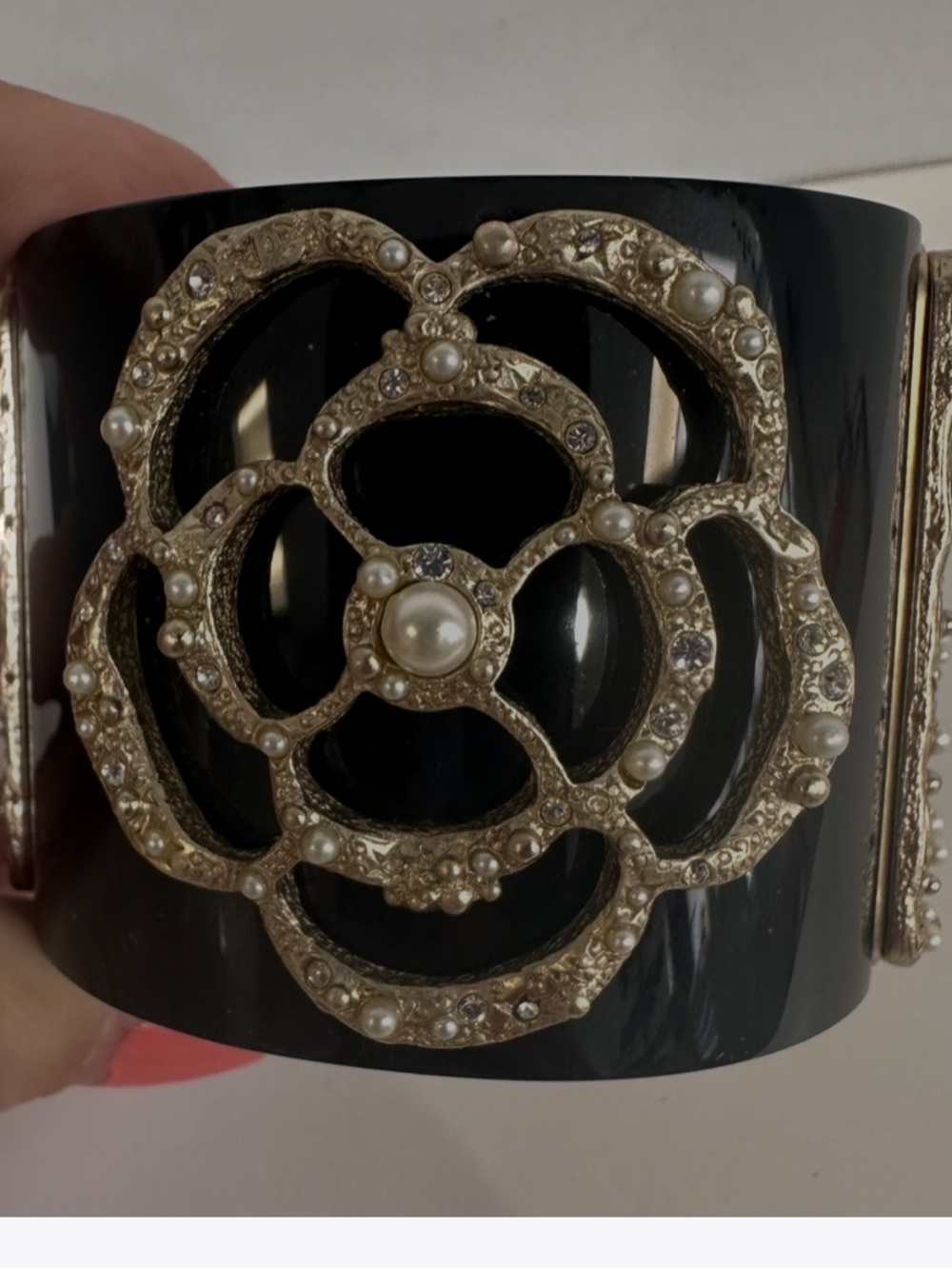 CHANEL Black and Gold Pearl-Embellished Cuff Bracelet